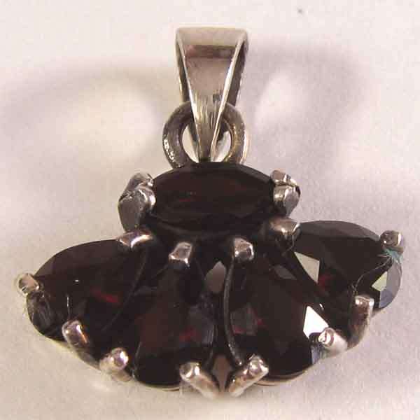 Sterling Silver and Genuine Garnets Pendant.