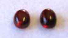 1 Lot of 2 pieces of 6.00 x 4.00 mm Oval cabochon cut Garnets T. W. 1.41ct.