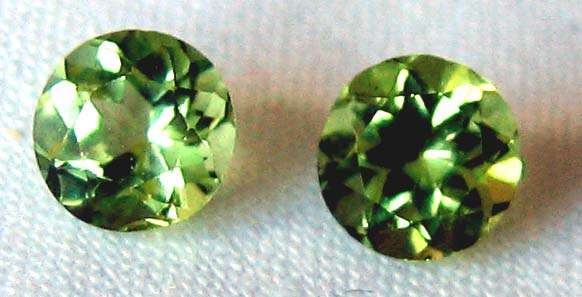 2 pieces 4.75mm round cut  Peridot , T. W. 0.86cts price/piece