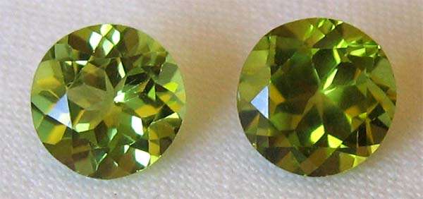 2 pieces 6.00mm round- faceted  cut  Peridots , T. W. 1.69cts price/ piece
