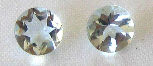2 pieces  5.00mm round cut  Aquamarines , T. W. 0.90cts