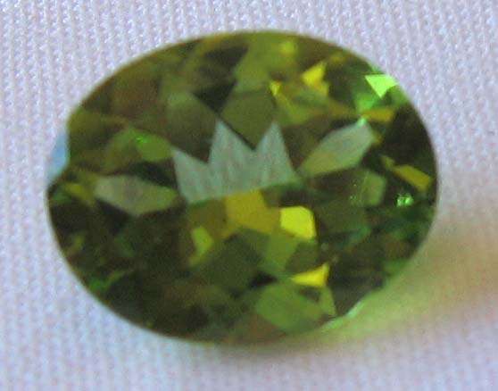 10.00 x 8.00 mm  Oval -faceted cut Peridot  2.40 cts