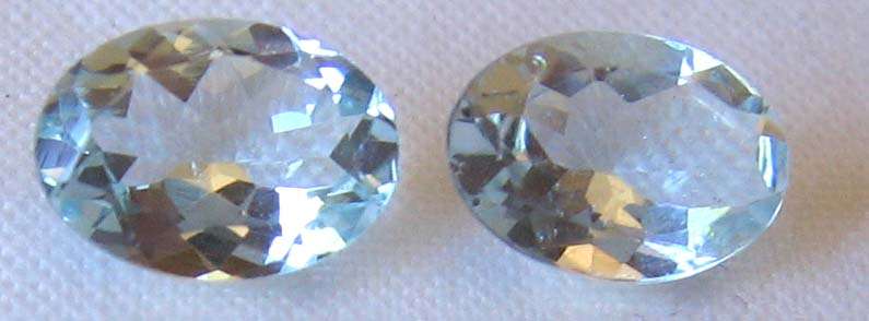 1 lot, 2 pieces , 7.00 x 5.00 mm  Oval - faceted cut Aquamarines, T. W.  1.19 CTs