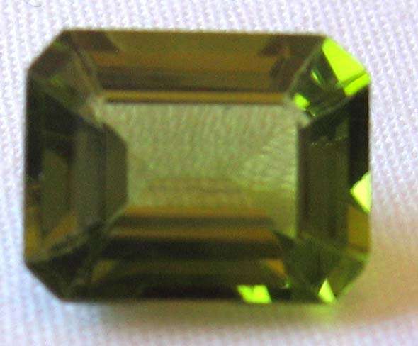 Genuine , 10.00 x 8.00 mm  Octagonal -faceted cut Peridot  3.33 cts
