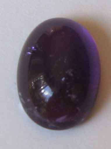 14.00 x 10.00 mm Oval cab Amethyst  5.91 cts.