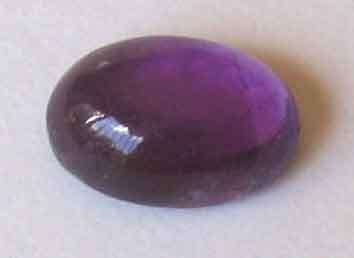 7.00 x 5.00 mm Oval Cabachon cut Amethyst,  0.80  cts.