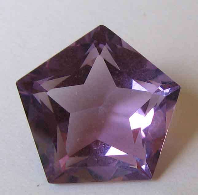 13.00 mm Fancy star Amethyst  6.51 cts.
