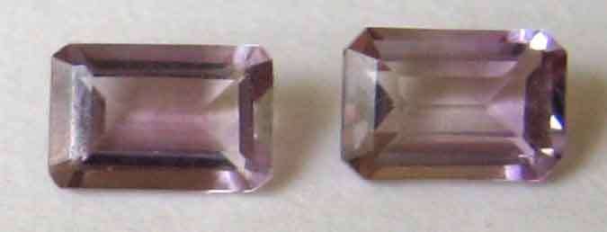 1 lot, 2 pieces of  3.90 x 5.90 mm Emerald  cut Amethysts T. W.  0.92 ct.