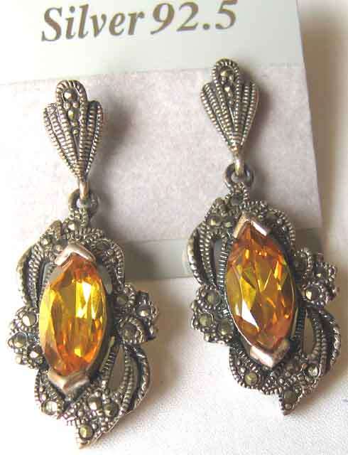 A Pair of Sterling Silver , Marcasite and Citrines Earrings.