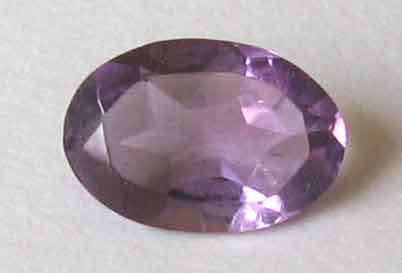 6.10 x 4.20 mm Oval faceted cut Amethyst 0.38 ct.