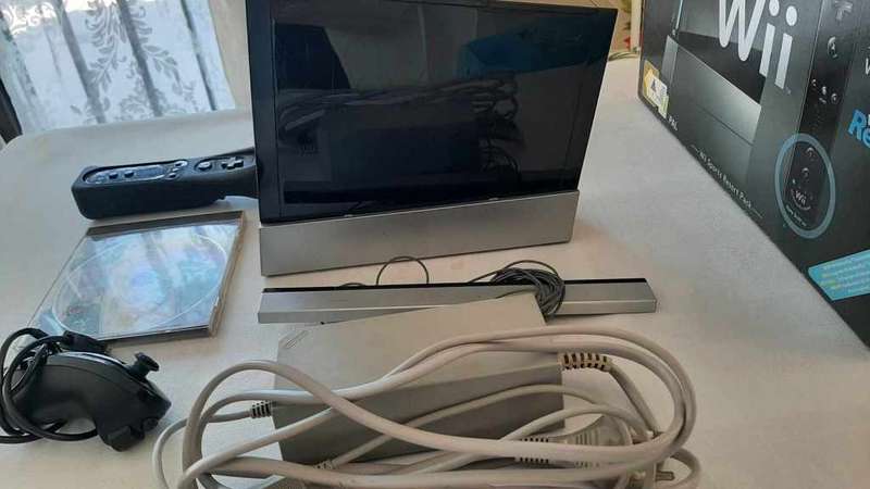 boxed wii console with wii sports and sports resort bundle