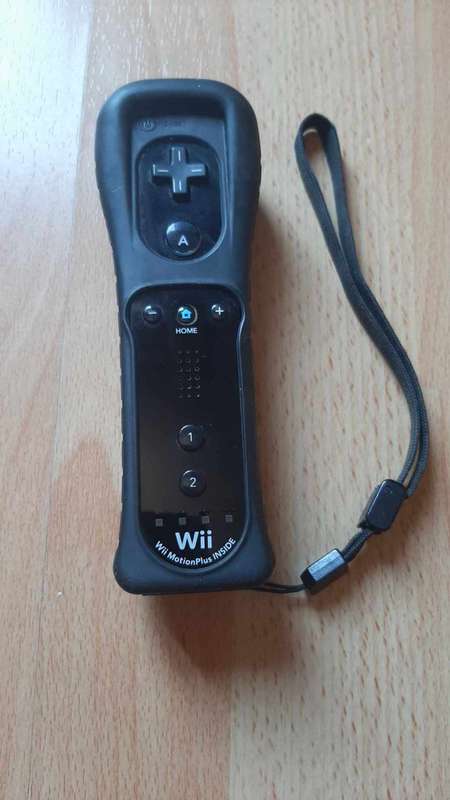 nintendo wii motion plus remote controller original with silicone sleeve and strap
