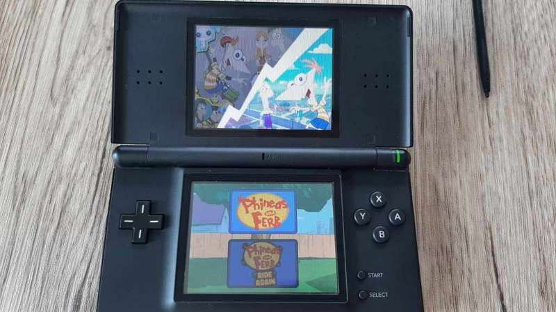 Nintendo ds lite console with charger and games