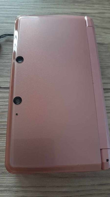 Nintendo 3ds console with original charger 3 games charging dock and case
