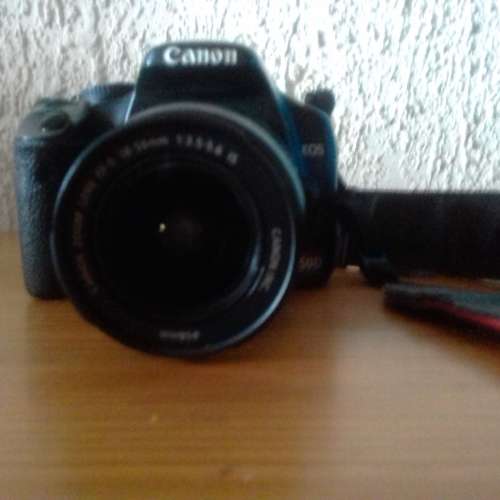 Canon 450d DSLR with 18-55mm lens, bag and all accessories.