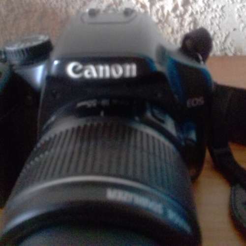Canon 450d DSLR with 18-55mm lens, bag and all accessories.