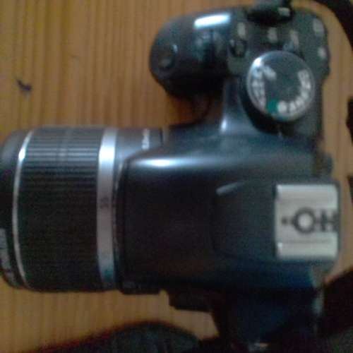 Canon 450d DSLR with 18-55mm lens, bag and all accessories.