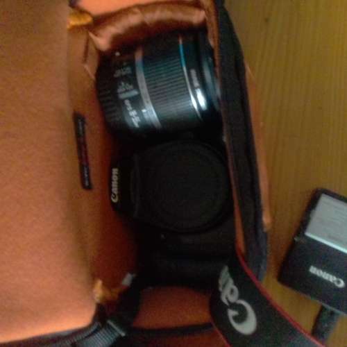 Canon 450d DSLR with 18-55mm lens, bag and all accessories.