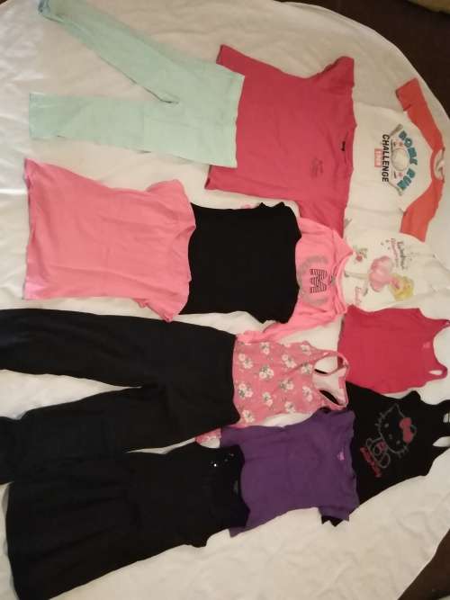 Lot of 13 pieces of girls clothing. Aged between 6 and 11 years