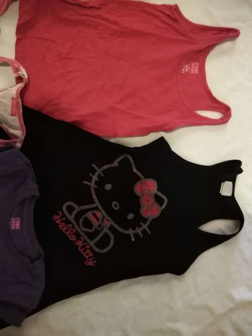 Lot of 13 pieces of girls clothing. Aged between 6 and 11 years