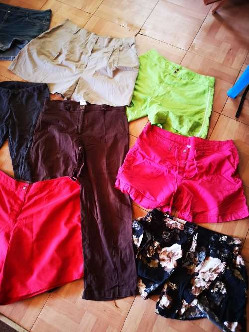 Large lot of women's clothing. Different sizes.