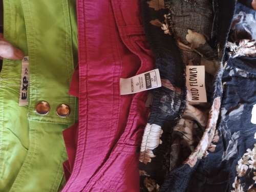 Large lot of women's clothing. Different sizes.
