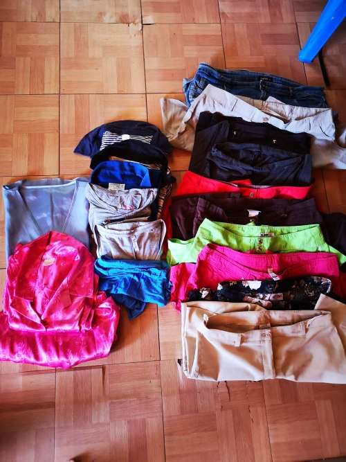 Large lot of women's clothing. Different sizes.