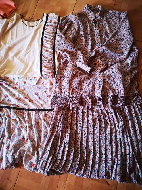 Large lot of women's clothing. Different sizes.