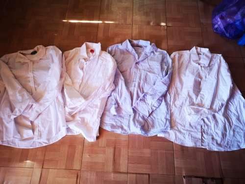 Large lot of men's clothing. Different sizes.