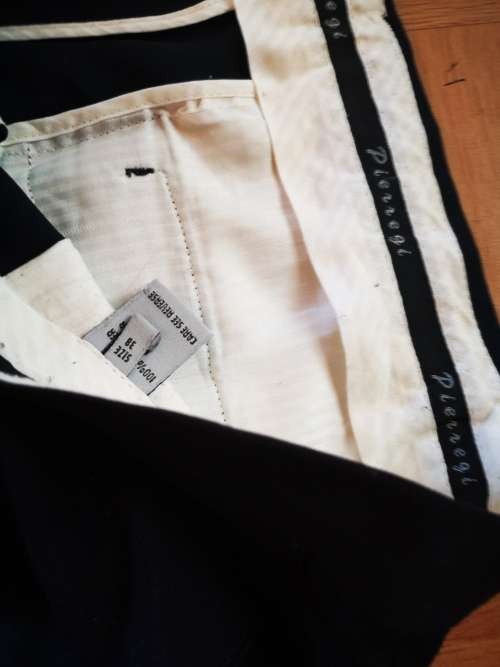 Large lot of men's clothing. Different sizes.