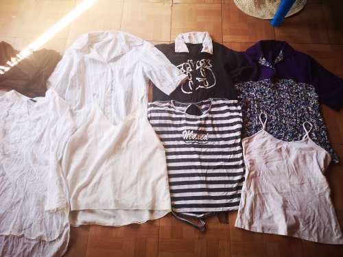 Huge lot of women's clothing. Sizes from small to large. Some nice vintage items included
