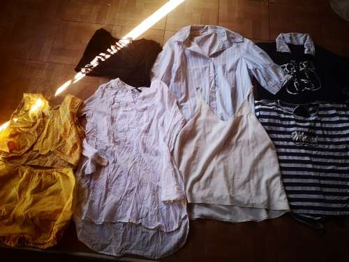 Huge lot of women's clothing. Sizes from small to large. Some nice vintage items included