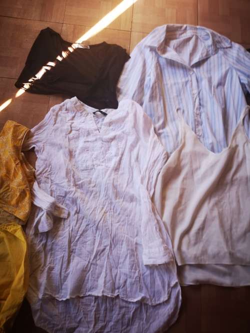 Huge lot of women's clothing. Sizes from small to large. Some nice vintage items included