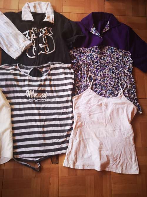 Huge lot of women's clothing. Sizes from small to large. Some nice vintage items included
