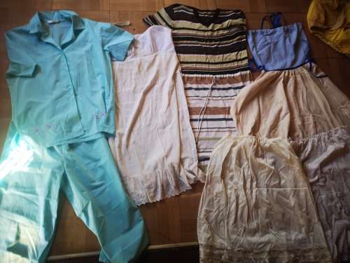 Huge lot of women's clothing. Sizes from small to large. Some nice vintage items included