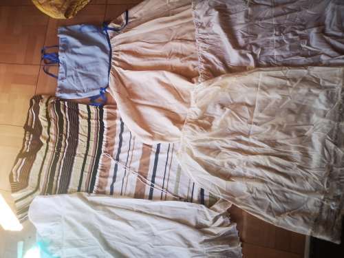 Huge lot of women's clothing. Sizes from small to large. Some nice vintage items included