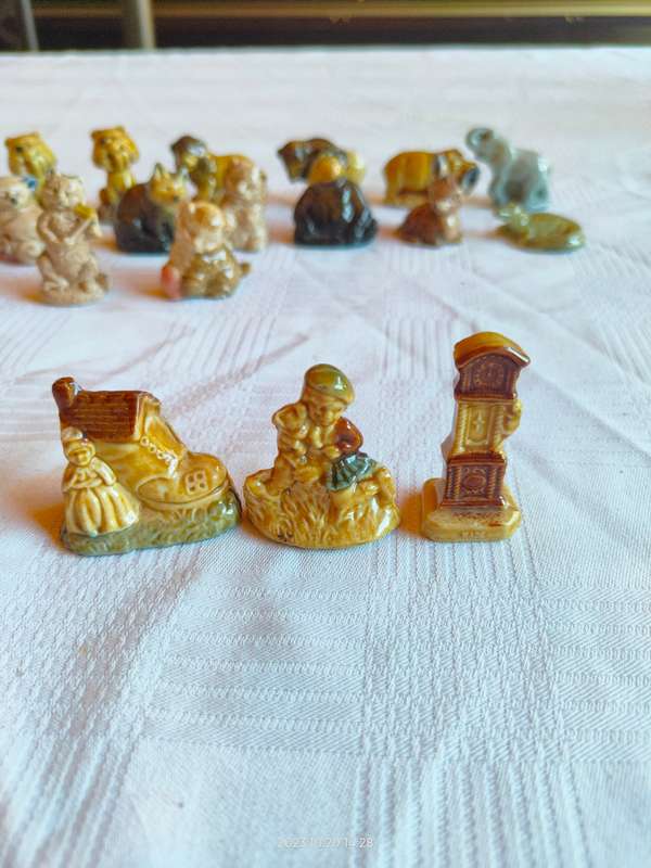 Nice large lot of vintage Wade Whimsies ornaments.