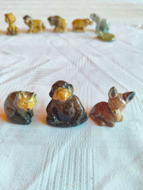 Nice large lot of vintage Wade Whimsies ornaments.