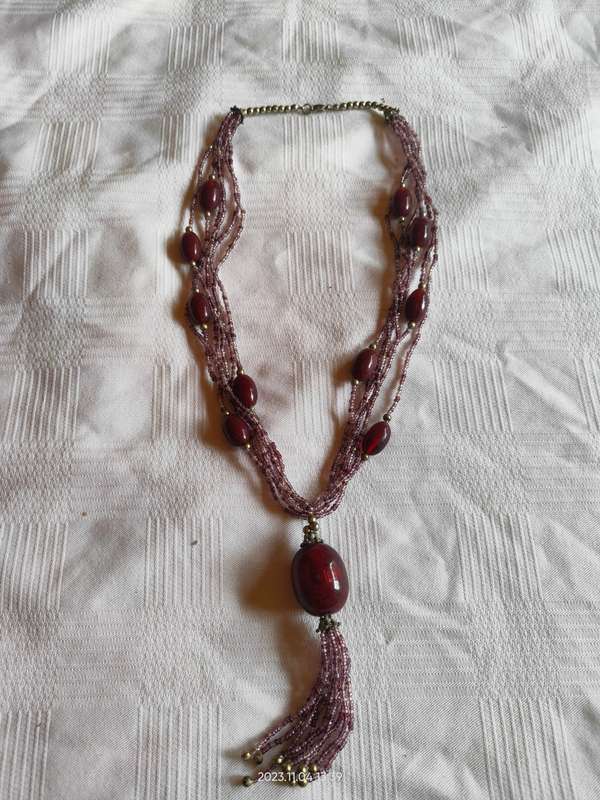 Stunning multistrand purple beaded necklace