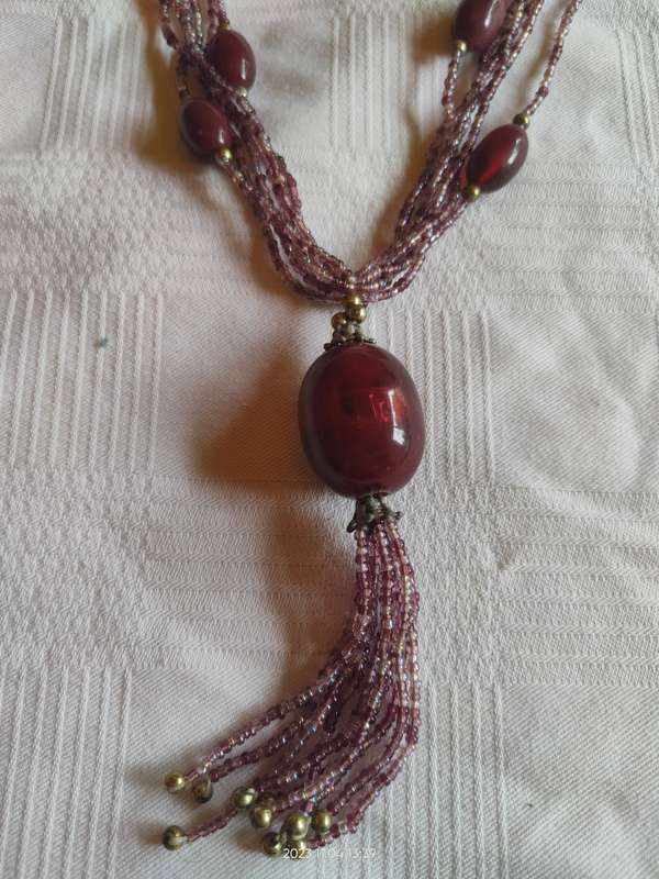 Stunning multistrand purple beaded necklace