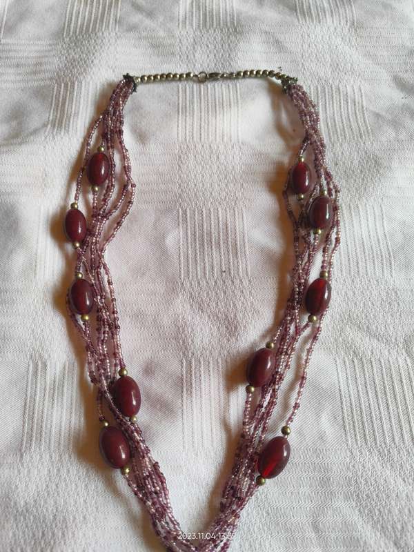 Stunning multistrand purple beaded necklace
