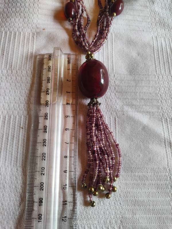 Stunning multistrand purple beaded necklace