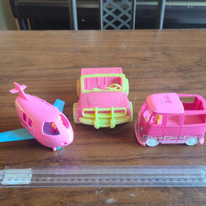 Three pink vehicles - 2 Barbie and 1 Simba