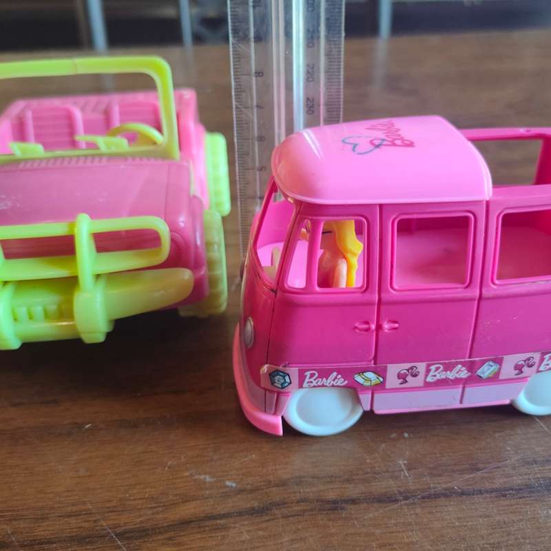 Three pink vehicles - 2 Barbie and 1 Simba