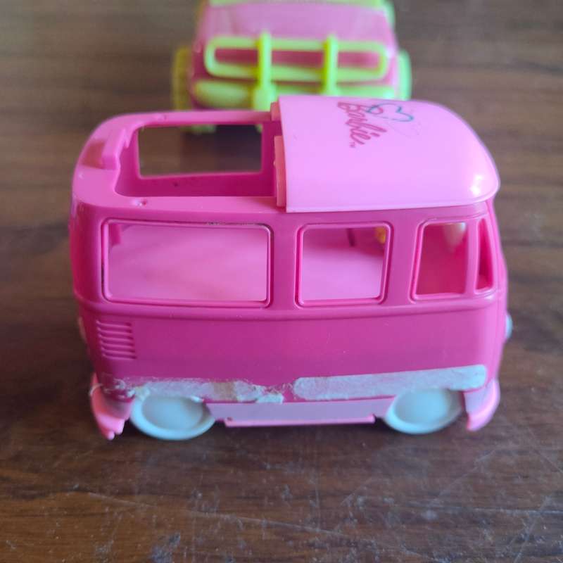 Three pink vehicles - 2 Barbie and 1 Simba