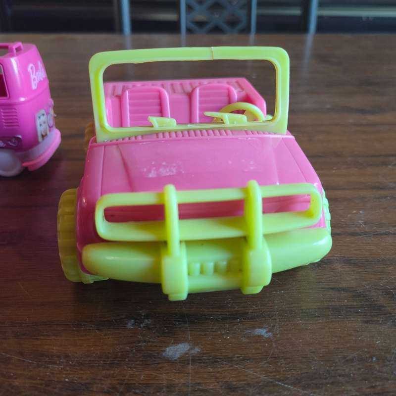 Three pink vehicles - 2 Barbie and 1 Simba