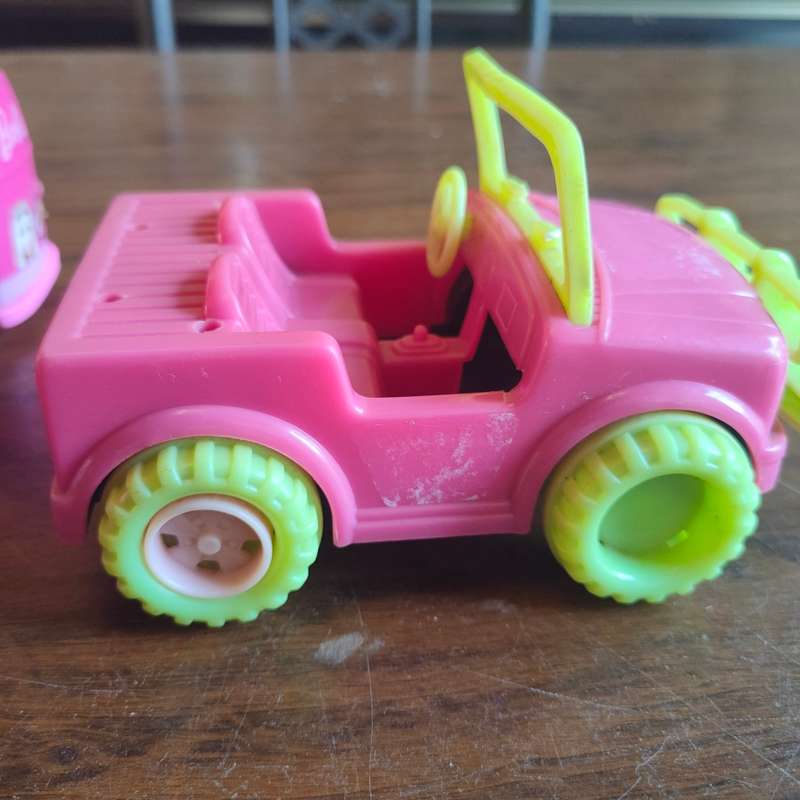 Three pink vehicles - 2 Barbie and 1 Simba
