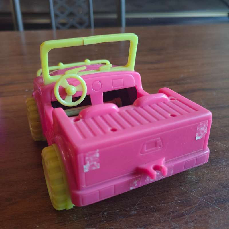 Three pink vehicles - 2 Barbie and 1 Simba