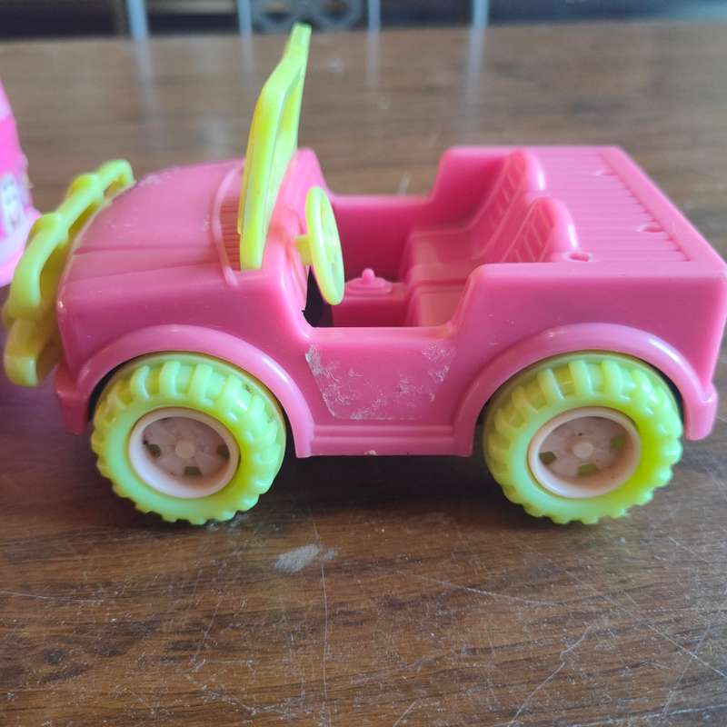 Three pink vehicles - 2 Barbie and 1 Simba