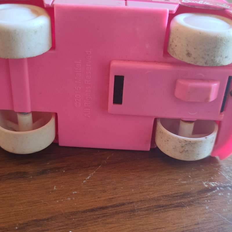 Three pink vehicles - 2 Barbie and 1 Simba